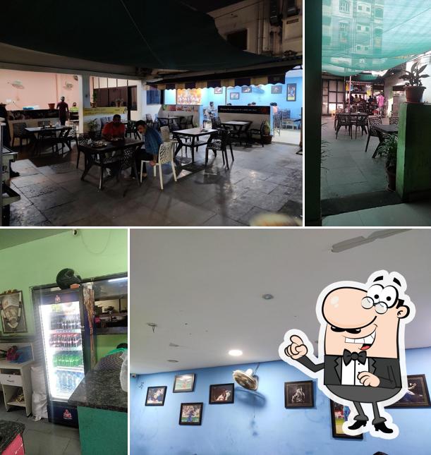 Take a seat at one of the tables at NALABHEEMA KITCHEN