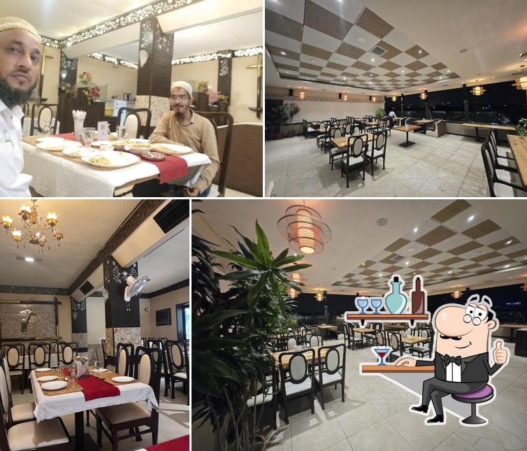 The interior of Harmony's Restaurant Veg RoofTop, Hotel Santoor