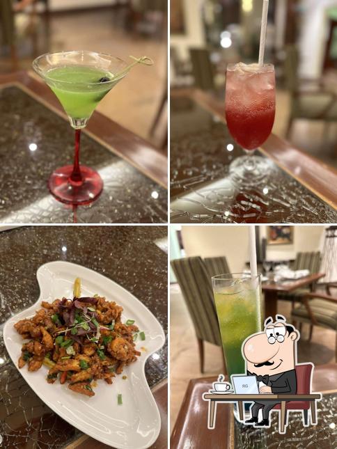 Among various things one can find interior and drink at OKO - The Lalit Mumbai
