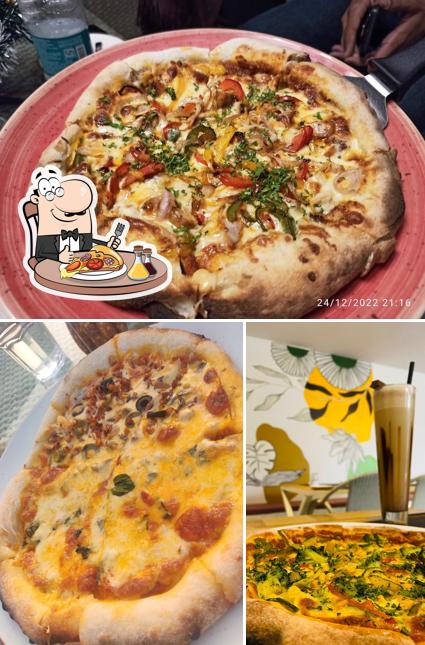 Get pizza at The Olive & Greens / Restaurant in Zirakpur / Rooftop Restaurant