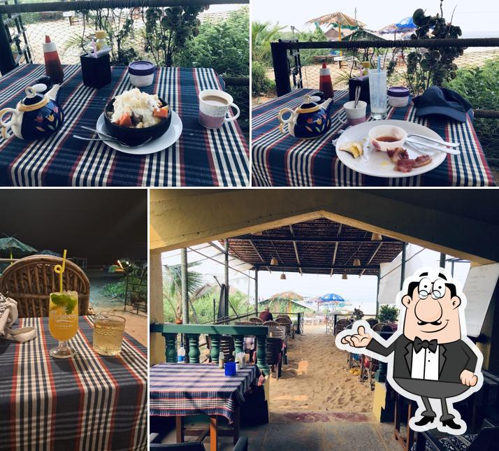 Take a seat at one of the tables at Luretha and Polly's Bar and Kitchen