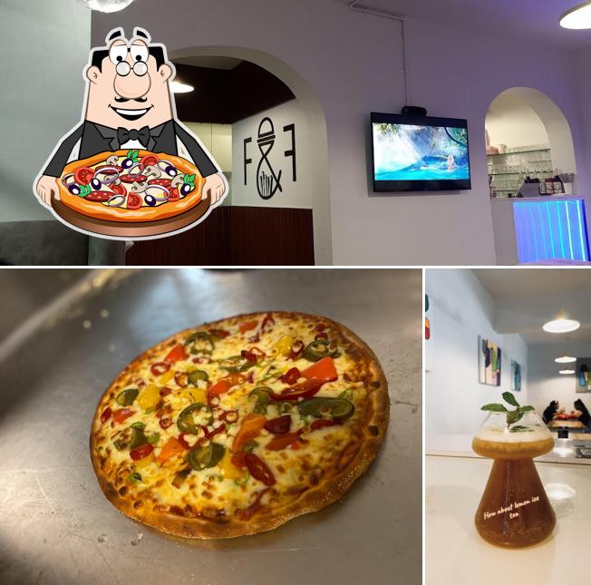 Get pizza at Friends & Fries Cafe