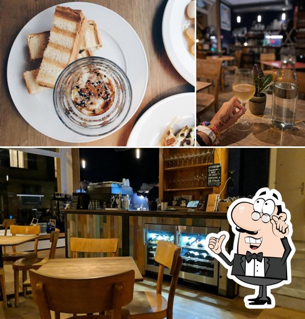 Guarda la foto che mostra la interni e cibo di 169 West