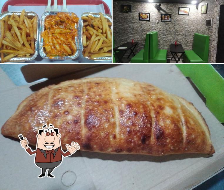 Check out the image displaying food and interior at PIZZA INBOX