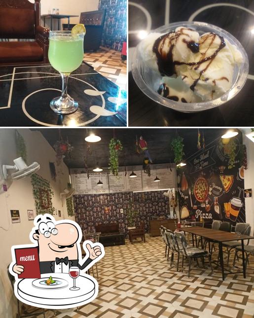 The photo of Pizza Hub’s food and interior