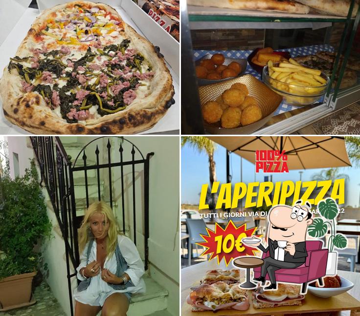 Dai un’occhiata alla foto che presenta la interni e cibo di 100% Pizza 3