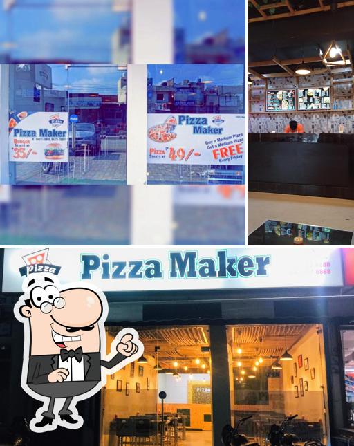 Take a seat at one of the tables at CB Pizza Maker