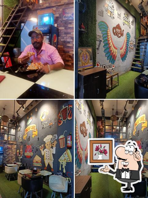 Take a seat at one of the tables at TALAP CAFE