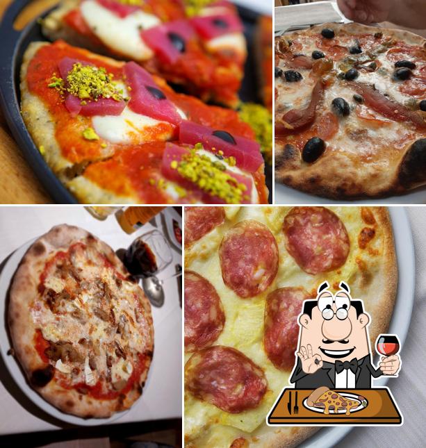 A Ristorante Al Campanile, puoi provare una bella pizza