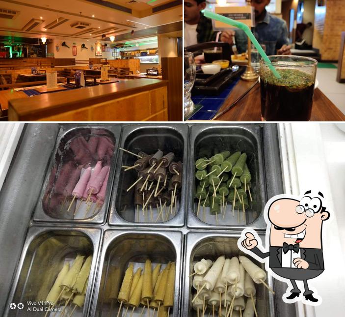 This is the picture showing exterior and food at Barbeque Nation