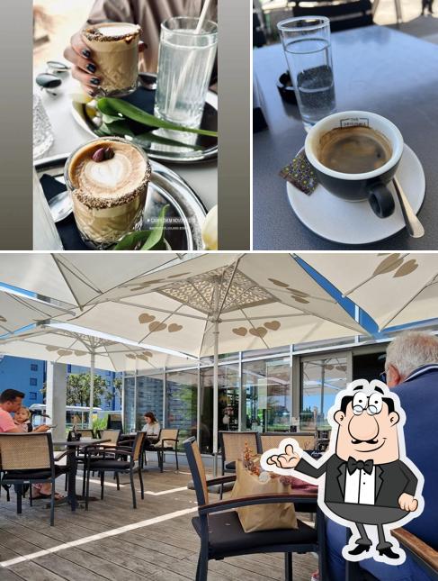 Guarda la immagine che presenta la interni e cibo di Carpe Diem Novo mesto - bar
