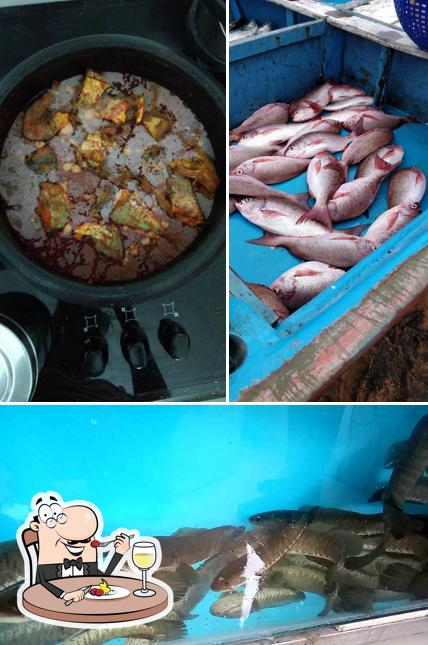 This is the picture displaying food and exterior at Maangadans Fish Mart