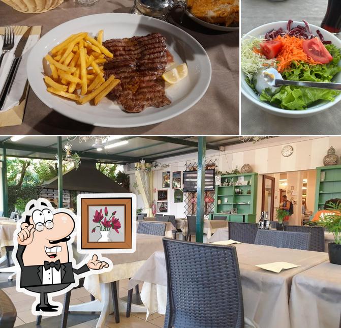 Ristorante Pizzeria Cisano si caratterizza per la interni e cibo