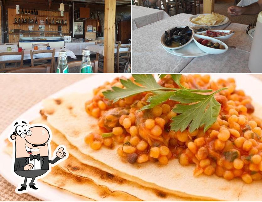 La foto della interni e cibo di ristorante le dune