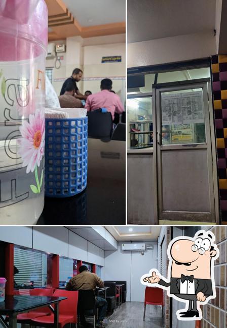 Take a seat at one of the tables at Anvitha Biryani