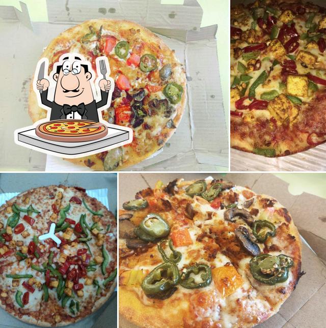 Try out pizza at Domino's Pizza Mandi Mohalla, Mysuru