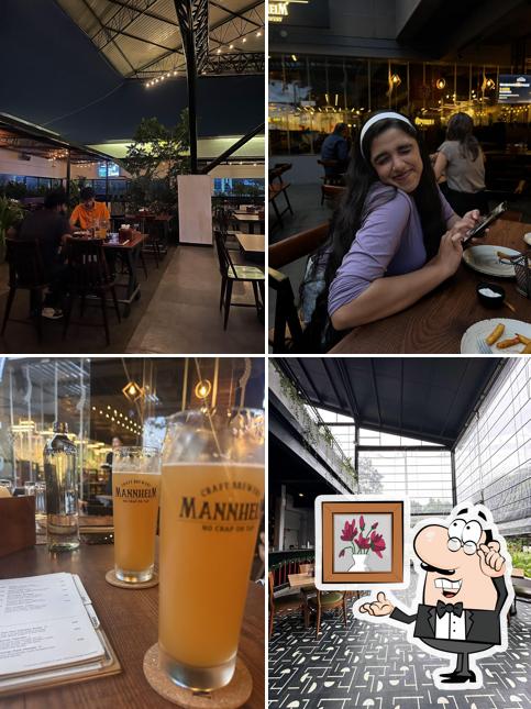 Take a seat at one of the tables at Mannheim Craft Brewery Ecoworld Take a seat at one of the tables at Mannheim Craft Brewery Ecoworld