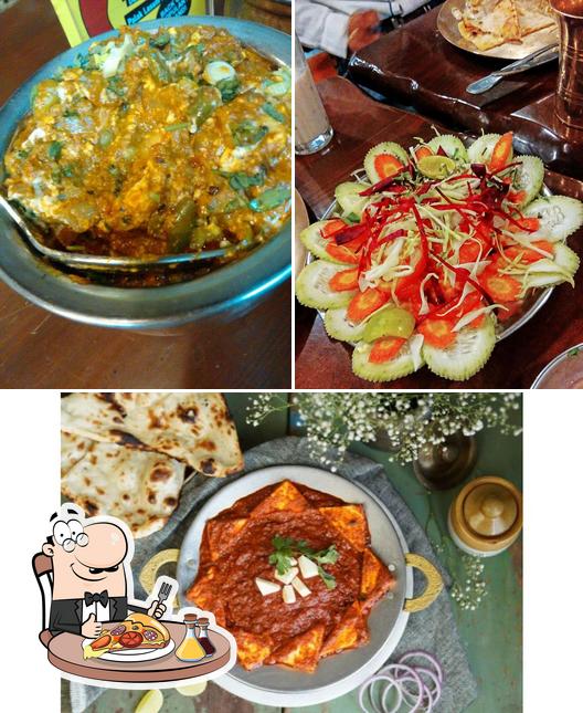 Try out pizza at Mirch Masala, Satellite