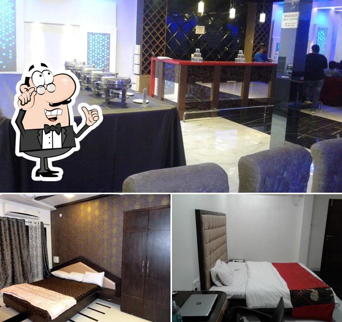 Take a seat at one of the tables at Hotel Indigo Inn