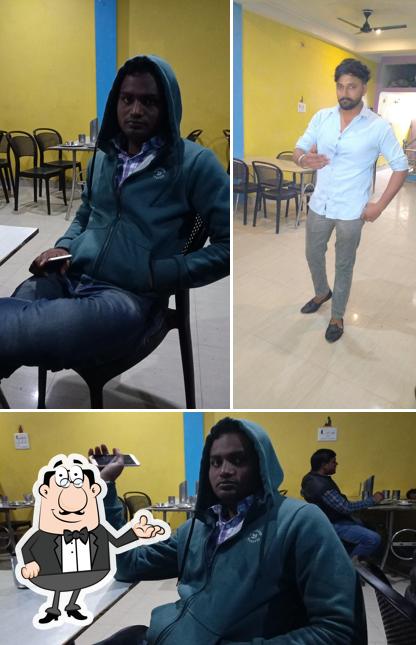 Take a seat at one of the tables at Paras Restaurent