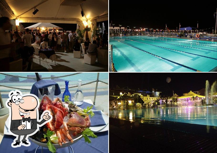 Questa è la foto che raffigura la esterno e cibo di Ristorante Balena 2000 Viareggio 392 5051562 Club Spa