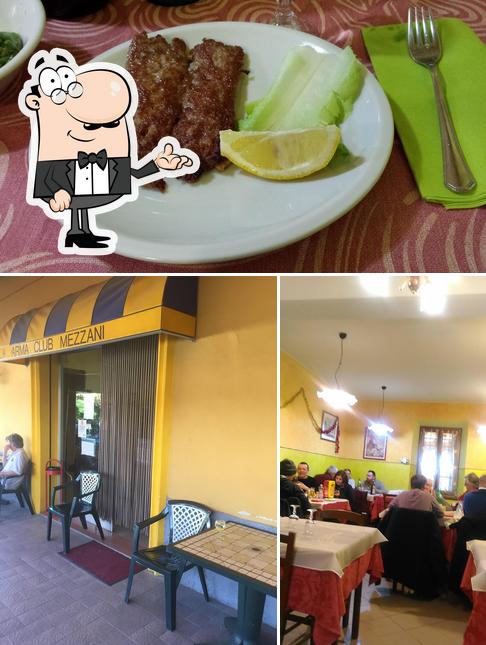 La foto della interni e cibo di Trattoria Bar La Parmetta