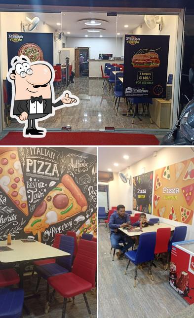 The interior of Pizza Yum Yum