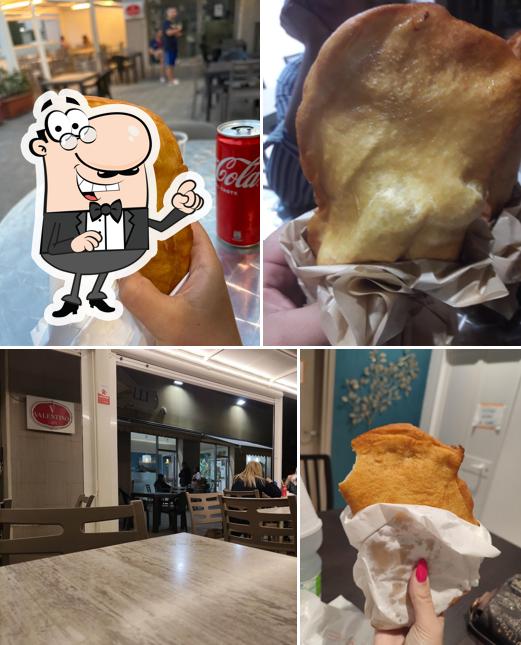 La immagine di interni e cibo da Pizzeria Romanelli Tor Pisana