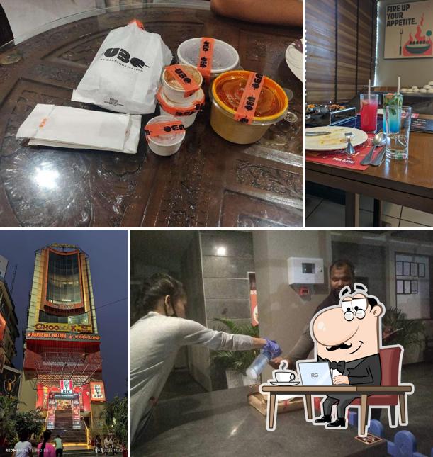 Take a seat at one of the tables at Barbeque Nation