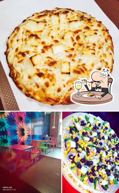 Take a look at the photo depicting food and interior at Demos Pizza