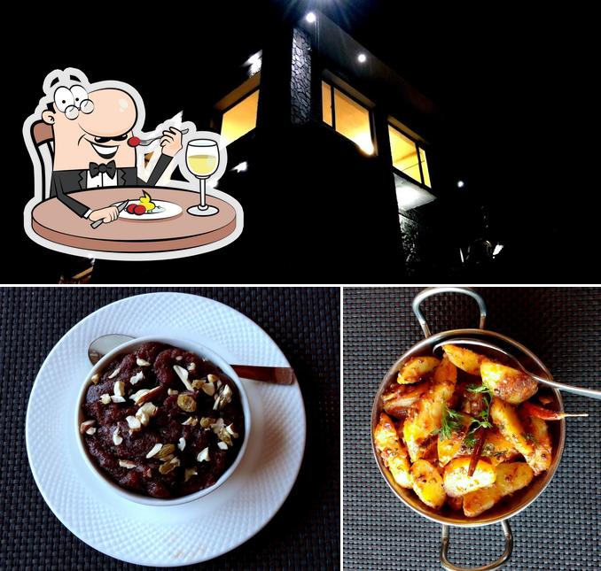 This is the picture displaying food and exterior at Heritage Inn Jageshwer