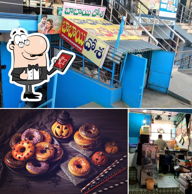 The photo of exterior and dessert at Babai Dosa
