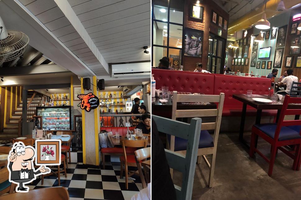 Take a seat at one of the tables at Pop Tates Khar