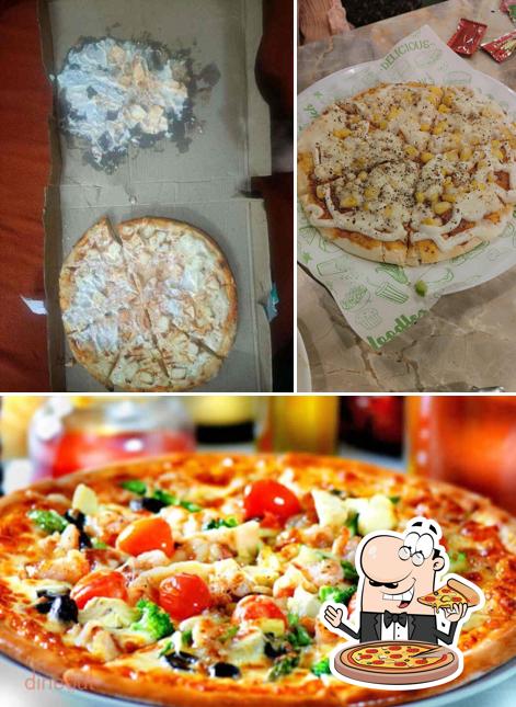 Pick pizza at Happy club and resturant