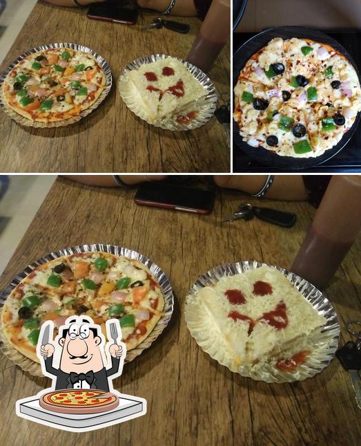 Get pizza at RBCc CAKES & BAKES