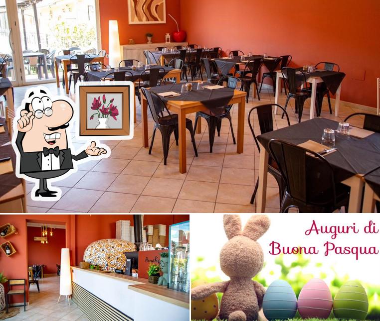 La immagine di interni e cibo da Pizzeria Il Covo Dei Ghiotti