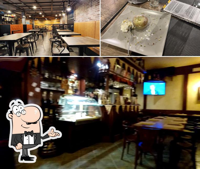 Dai un’occhiata alla immagine che raffigura la interni e cibo di Paradise Pizza Grill & Beers