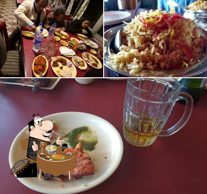 This is the photo depicting food and dining table at Simla Bar & Restaurant Best Party Place