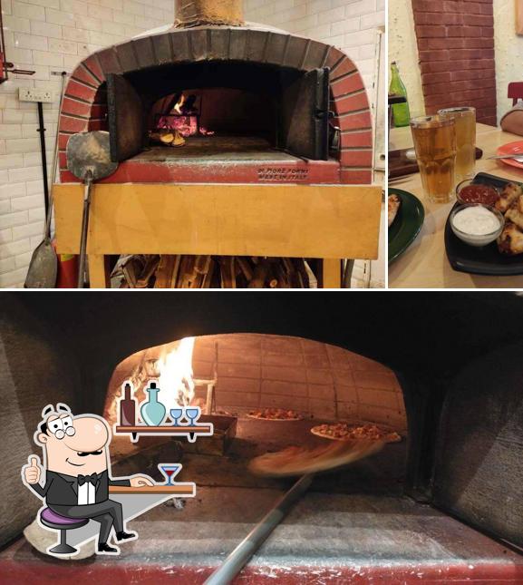 The picture of interior and beer at 1441 pizzeria