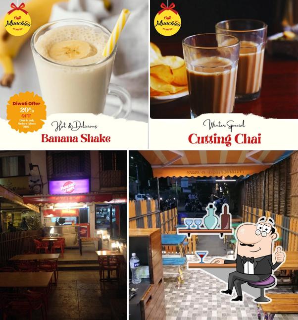Check out the picture displaying interior and drink at Cafe Munchies n' more