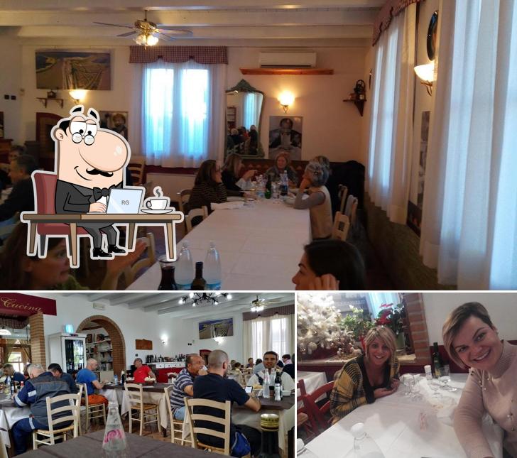 Dai un'occhiata agli interni di Osteria La Corte
