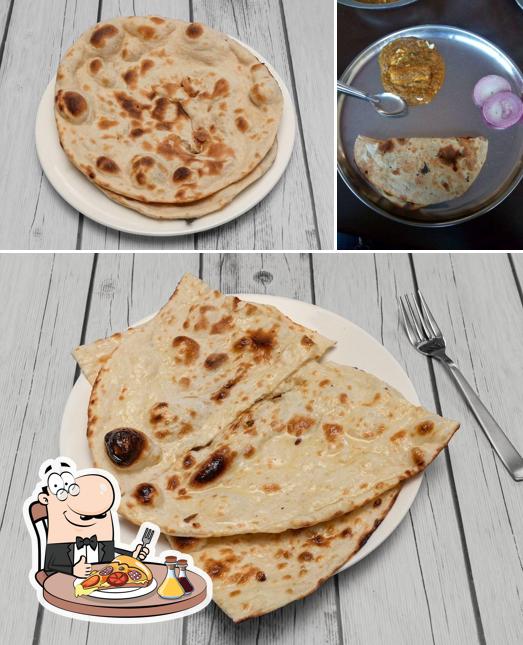 Try out pizza at Prince Restaurant
