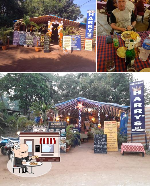 Check out the photo depicting exterior and dining table at Harry's Bar & Restaurant