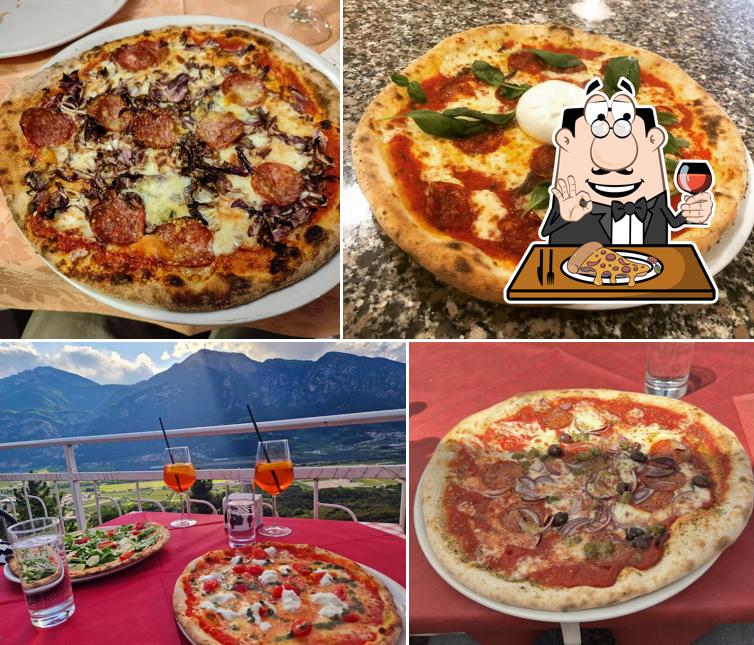 A Ristorante Pizzeria La Roccia, puoi assaggiare una bella pizza