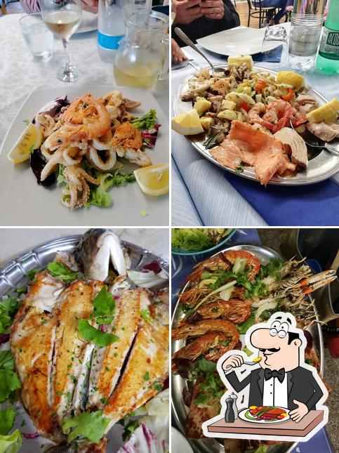 Platti al La Baia Del Pescatore/ L'oasi del pescatore