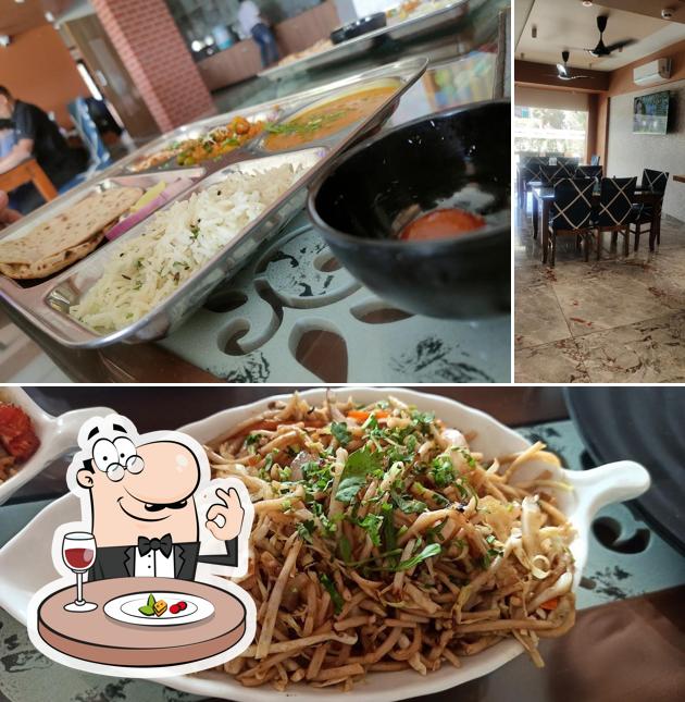 The picture of Punjabi tadka family restaurant’s food and interior