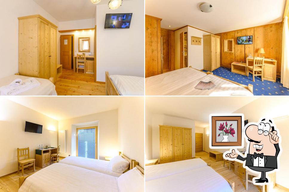 Siediti a un tavolo di Hotel Centrale Poschiavo, Typically Swiss