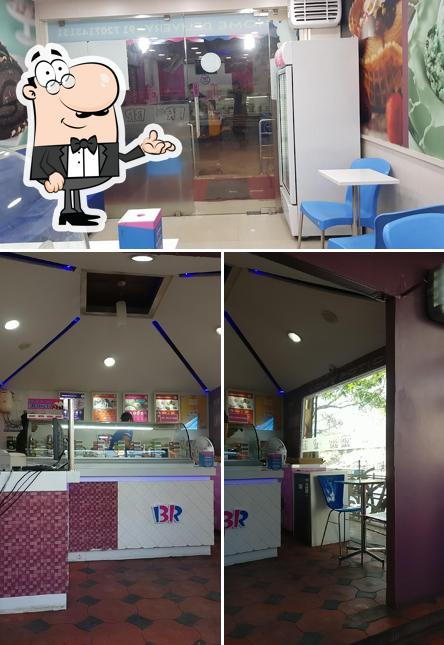 Take a seat at one of the tables at Baskin Robbins