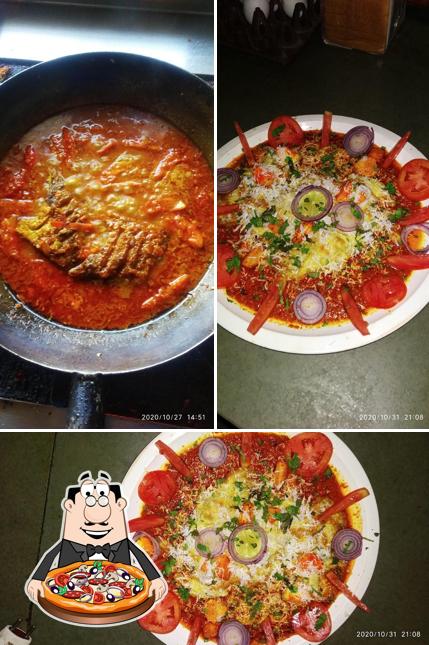 Try out pizza at New India Restaurant