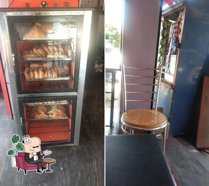Take a seat at one of the tables at New Ragam Bakery